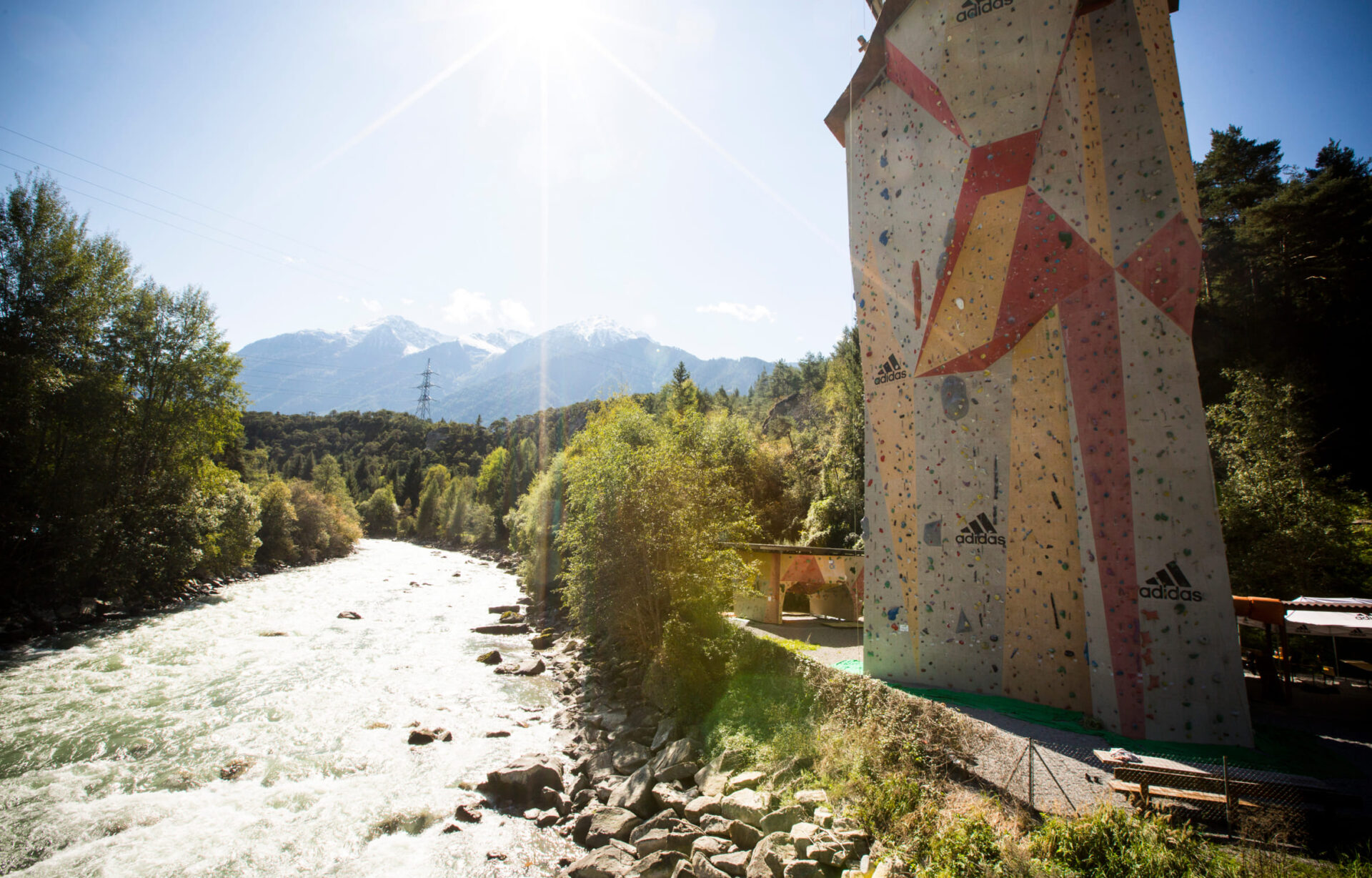 AREA 47 climbing tower in Ötztal, Tyrol, next to a river and surrounded by nature