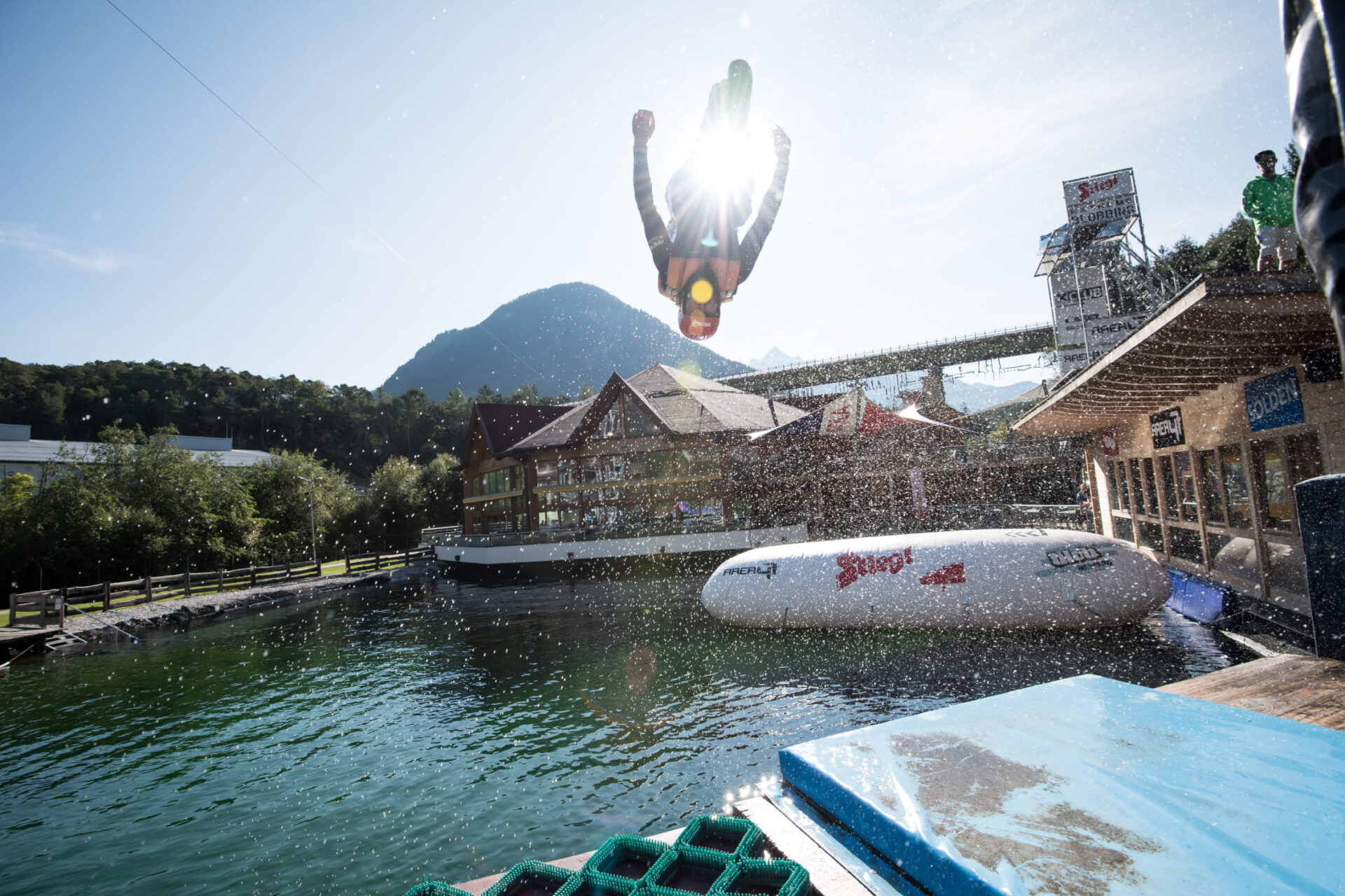 Person does a backflip while blobbing at AREA 47 in Ötztal, Tyrol