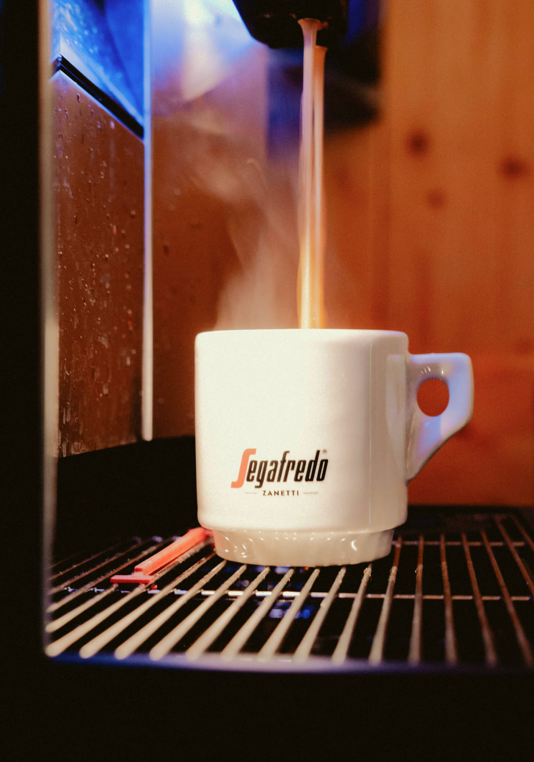 Freshly brewed coffee from a vending machine in AREA 47, Ötztal, Tyrol