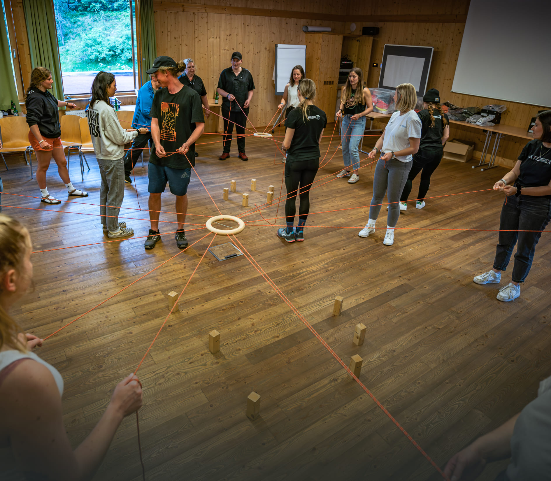 Group at a team challenge with ropes in the AREA 47, Ötztal, Tyrol