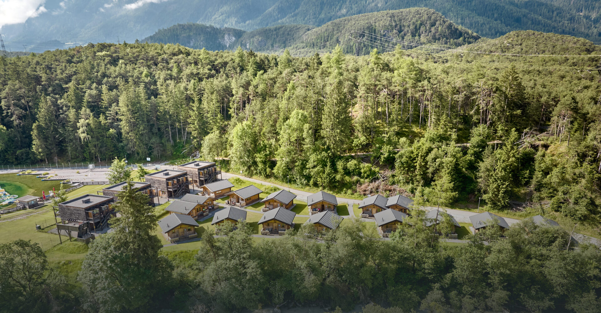 Aerial view of the AREA 47 adventure area in Ötztal, Tyrol, surrounded by forest