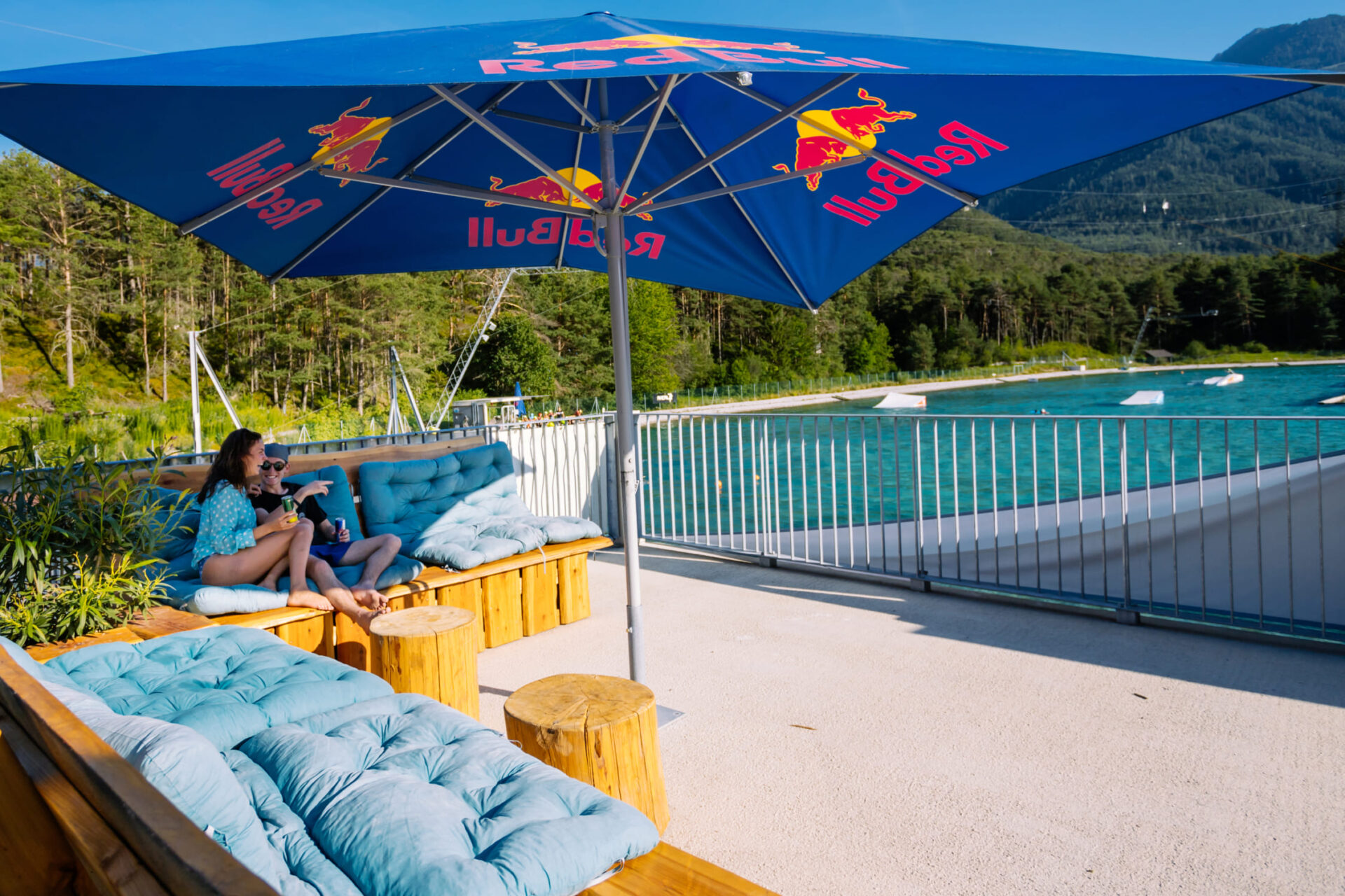 Lounge in the Wake Café at AREA 47 with a view of the Water AREA, Ötztal, Tyrol